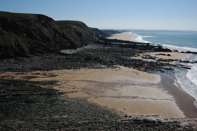 View over Duckpool and beaches towards Bude at low tide
